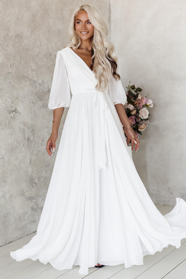 Rebekas balta kāzu kleita ar pilniem svārkiem