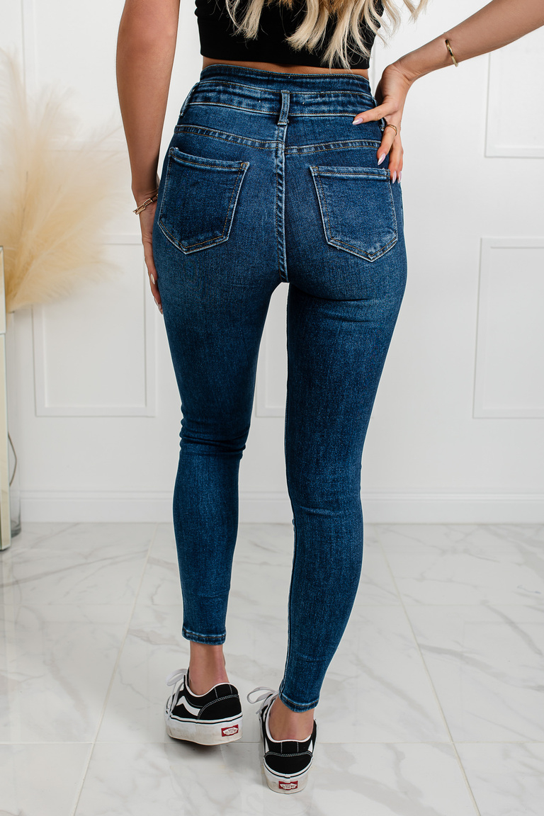 Tumši zili elastīgi džinsi ar augstu jostasvietu